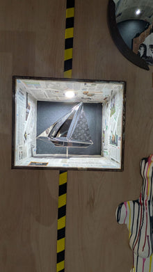 Sculpture Bateau Vuitton 40 de l’artiste Arcanis — acier poli miroir, cuir et savoir-faire français