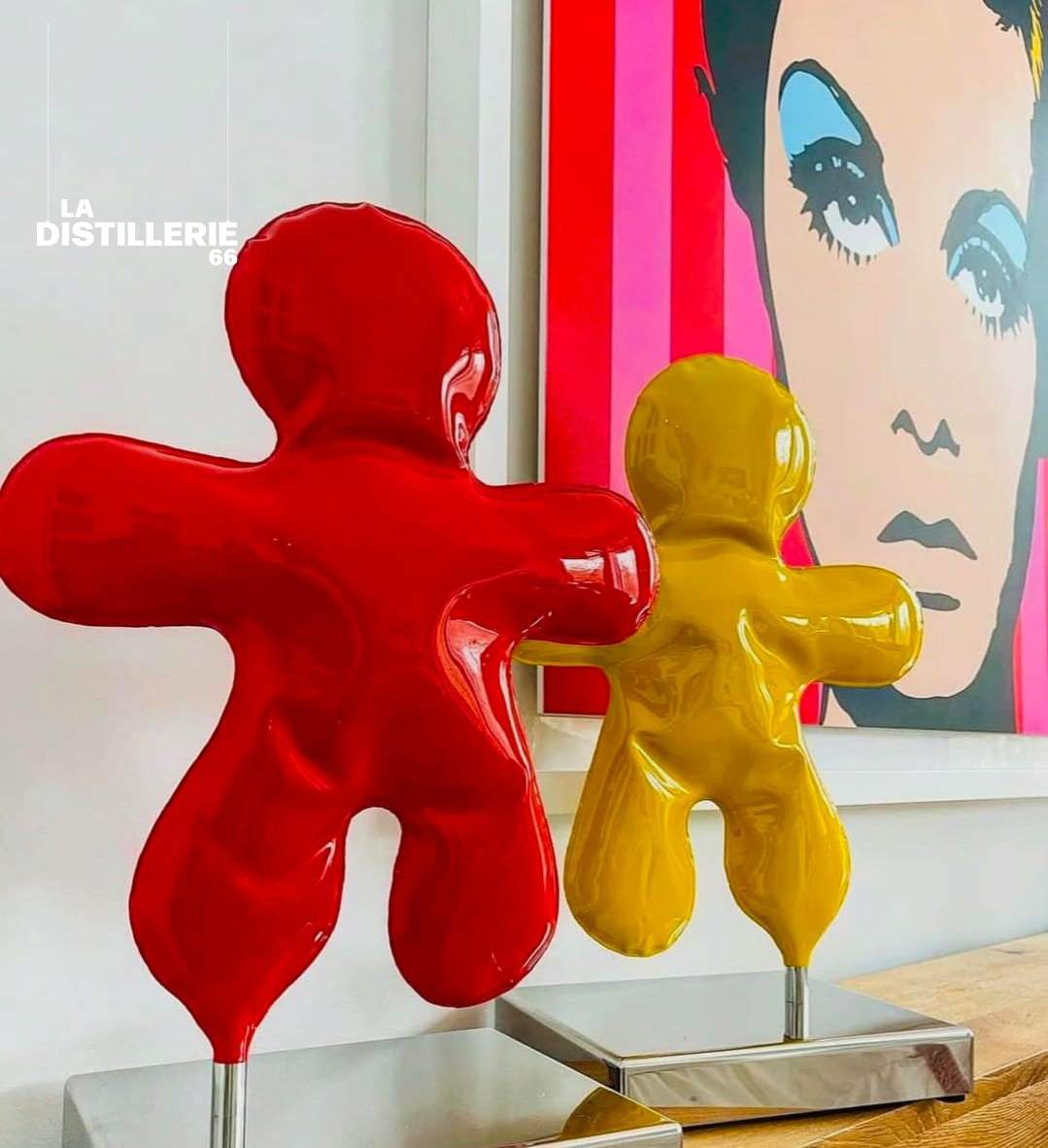 Petit Bonhomme jaune — création de Henri Iglesis, sculpture en métal soufflé
