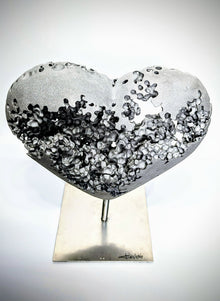 Œuvre Amour par Tiguéné — chaudronnerie, aluminium coulé et sculpture contemporaine